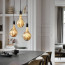 Sfeerbeeld van de Calex LED Filament Lamp Organic EVO XXL Champagne Ø165 E27 6W